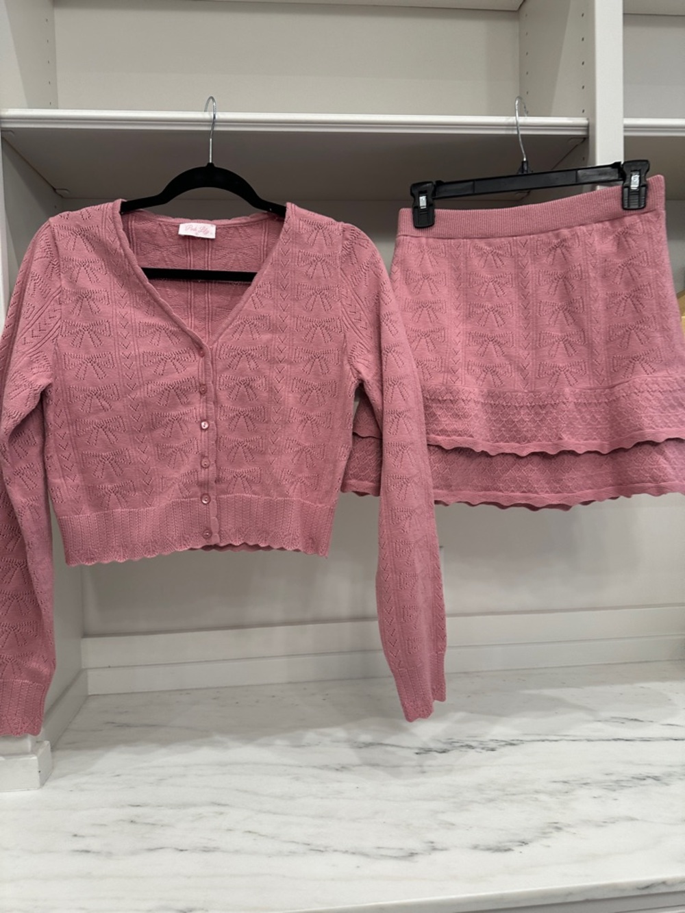 Pink Lily small textured knit pink
Mini Skirt set. Like new